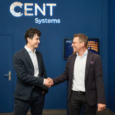 Business handshake representing successful partnership and client references at Cent