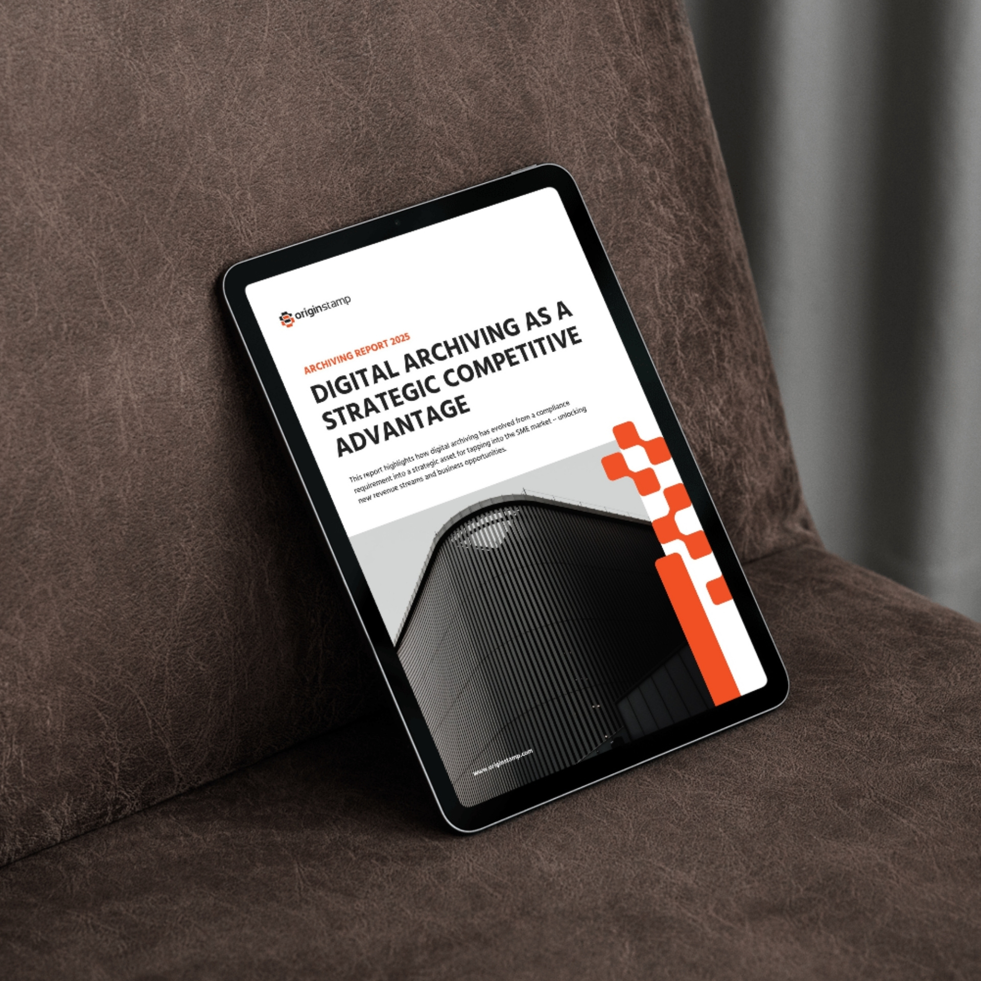 Tablet displaying a digital archiving report on a brown leather surface.